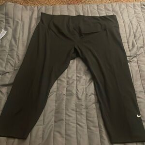 Nike all black white Nike sign on the bottom